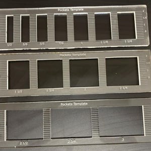 May include: Three clear plastic templates with different sized rectangular cutouts labeled "Pockets Template". The cutouts are labeled with fractions, such as 1/2, 5/8, 3/5, 7/8, 1, 1 1/8, 1 1/4, 1 1/2, 1 3/4, 2, 2 1/4, 2 1/2, 2 3/4, and 3.