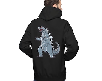 May include: Black hoodie with a cartoon illustration of a grey Godzilla-like monster on the back. The monster has red eyes and white spikes. The hoodie has a drawstring hood and a kangaroo pocket.