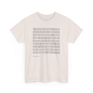 May include: Cream-colored t-shirt featuring a square pattern of vertical black lines. The word "Oyako" is printed in black below the pattern. The shirt has short sleeves and a crew neck.