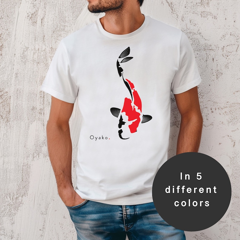 May include: White t-shirt featuring a black and red koi fish design. The text "Oyakko." is printed below the fish.