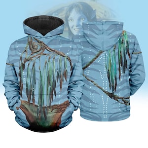 May include: Light blue hoodie with a detailed graphic inspired by the movie Avatar. The design features a tree-like structure with hanging leaves and a pattern of white dots. The hood is black, and the overall style is a comfortable, casual wear.