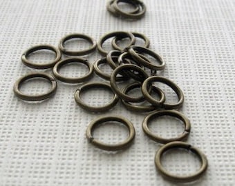 100 Antiqued brass 6mm 20 gauge open jump rings