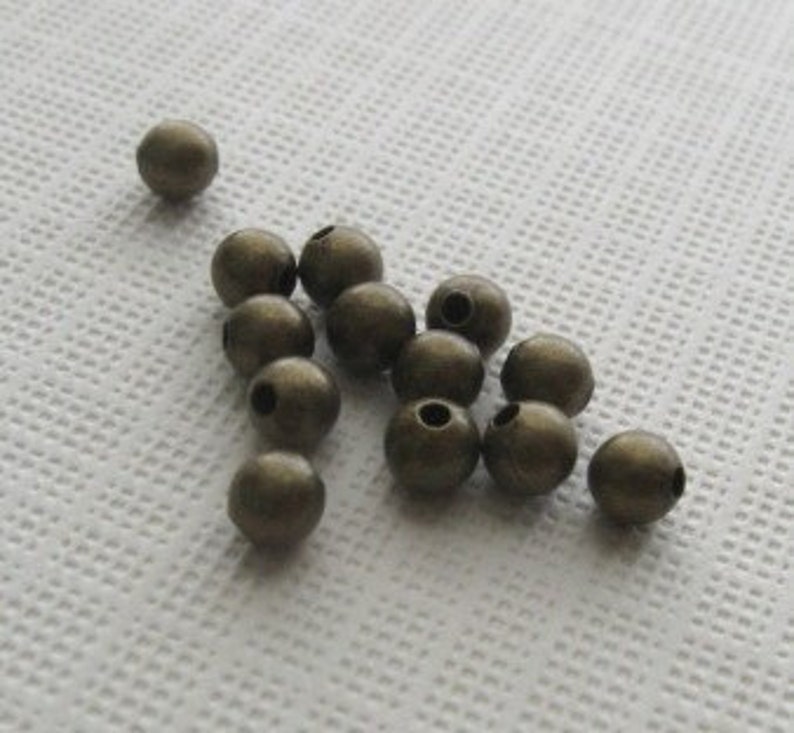 50 Antiqued brass 3mm round smooth beads image 1