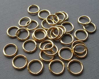 40 Gold plated brass 8mm 18 gauge soldered closed jumprings