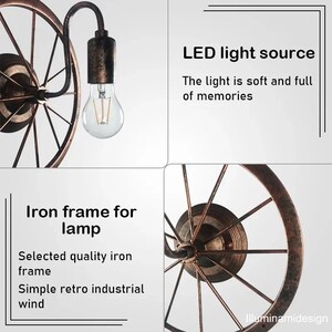 Lámpara de rueda de bicicleta de hierro forjado. imagen 6