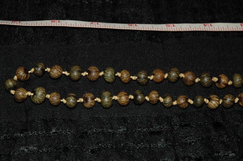 Coldwater Creek knotted natural seed necklace.