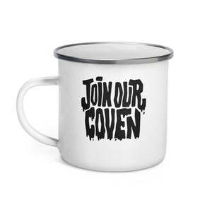 May include: White enamel mug with a silver rim and handle. The mug features the phrase "JOIN OUR COVEN" in bold, black, dripping-style lettering, perfect for fans of witchcraft and the occult.