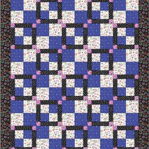 Puede incluir: Una colcha con un patrón de tablero de ajedrez de cuadrados azules, blancos y negros. Cada cuadrado tiene un patrón diferente de círculos blancos sobre fondo azul, puntos negros sobre fondo blanco o círculos blancos sobre fondo negro. La colcha está bordeada con un patrón de círculos negros y blancos.