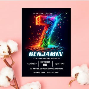 May include: A birthday party invitation card featuring a large, glowing number 7 constructed from colorful, pixelated blocks against a black background. The text reads: YOU ARE INVITED TO, BENJAMIN, 7TH BIRTHDAY PARTY, SATURDAY SEPTEMBER 08, 3pm- 6PM, 123 ANY ST. CITY LOCATION ANYWHERE, RSVP TO KATIE 123-456-7890.