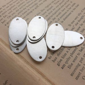 8 Small Aluminum Oval Blank Tags