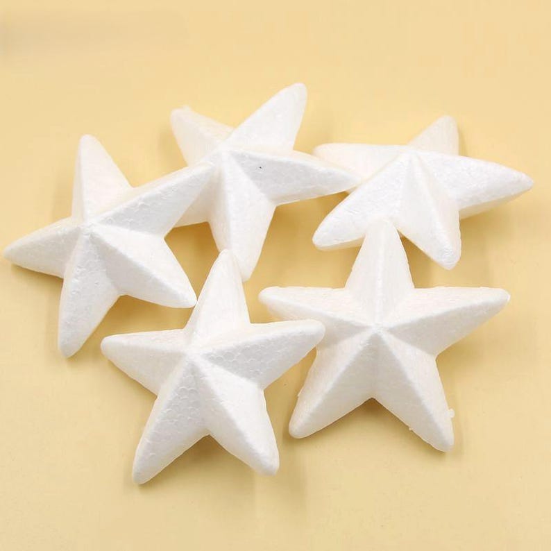 May include: Five white foam star shapes, perfect for crafting and decorating.