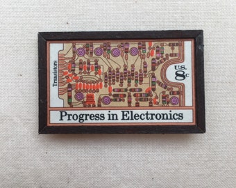 Framed transistor miniature stamp
