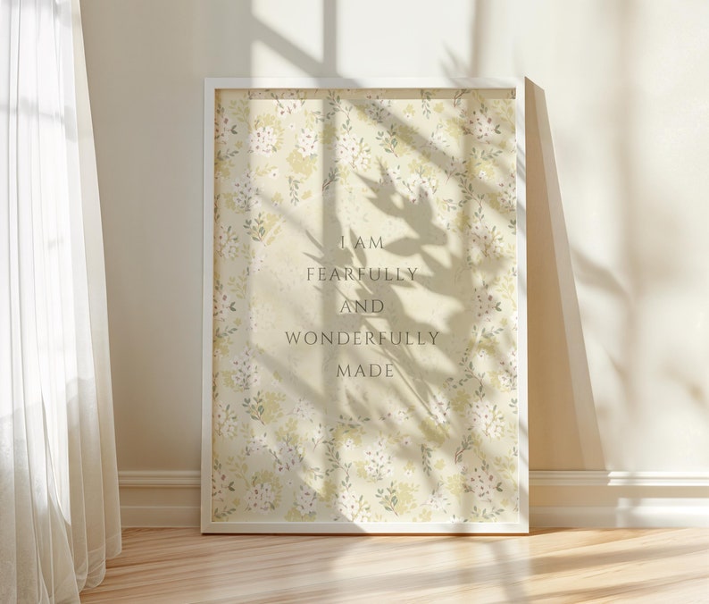 May include: A white framed print with a floral pattern and the text "I am fearfully and wonderfully made".
