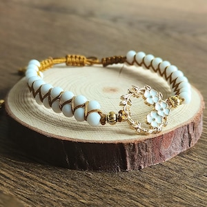 Bracciale con elemento a motivo floreale in oro 18 kt ... - Artlinea