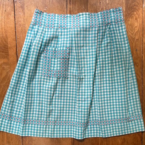 Lovely Vintage Apron handmade in green and white gingham with cross stitch details on the waistline, hem line and ties. 1950s