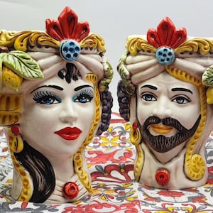Teste di moro Siciliane in ceramica di Caltagirone  fate a mano altezza h.26  con frutta