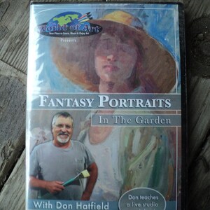 May include: DVD cover featuring a painting of a woman with a flower crown in a garden setting. The title of the DVD is "Fantasy Portraits: In The Garden" with the artist's name, Don Hatfield, listed below.