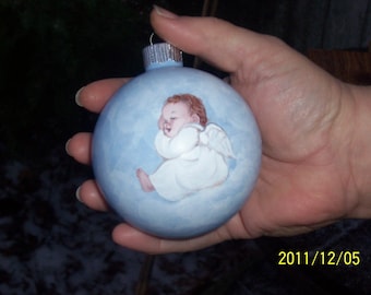 Baby's first christmas  ornament hand painted personalized for free with your own words.