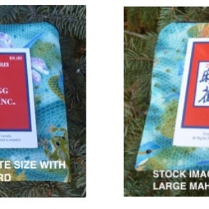May include: Two images of Mah Jongg cards on a patterned fabric. The cards are red and white, with the text "National Mah Jongg League, Inc." and "77th Year." One image shows a standard-sized card, the other a larger card.