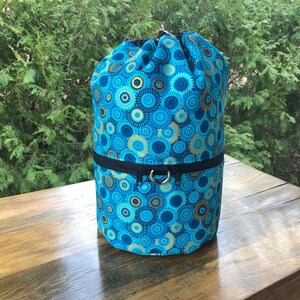 Blue and gold large round drawstring knitting or crochet project bag with pockets for WIP, Fancy Medallions, Large Kipster