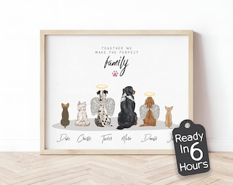 May include: A framed print with a white background and a black frame. The print features a line of six dogs with angel wings and halos. The dogs are facing away from the viewer. The text "Together we make the perfect family" is at the top of the print. The names of the dogs are written below them. The text "Ready in 6 hours" is on a black tag.