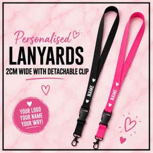 May include: Two 2cm wide lanyards, one black and one pink, each featuring a detachable black plastic clip and a metal hook. The text reads Personalised LANYARDS 2CM WIDE WITH DETACHABLE CLIP and YOUR LOGO YOUR NAME YOUR WAY with heart icons.