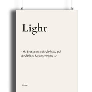 May include: A rectangular wall poster with a cream-coloured background and black text. The word Light is printed in a large serif font at the top. Below it, the text reads: The light shines in the darkness, and the darkness has not overcome it. John 1:5.