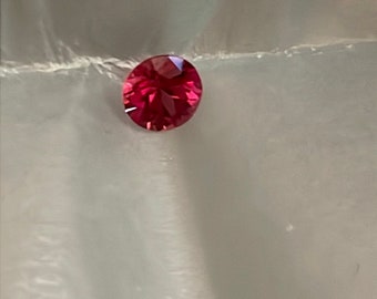 Saphir rouge/orange.61ct rond