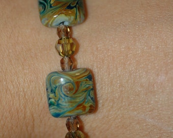 Neutral Bracelet, czech and lampwork glass beads in greens and golds