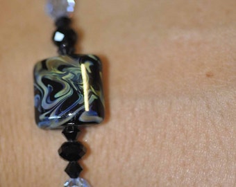 Lampwork square focal with a heart in Black and Blue Bracelet