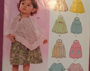 Simplicity 6501 New Look babies uncut pattern size A poncho romper
