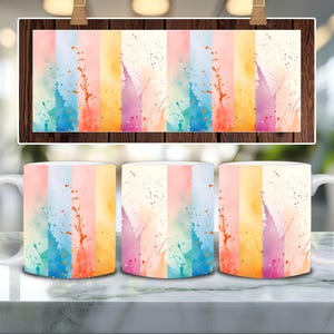 May include: Three white ceramic mugs with a colorful watercolor design. The design features vertical stripes of pink, orange, yellow, blue, and purple with white speckles.