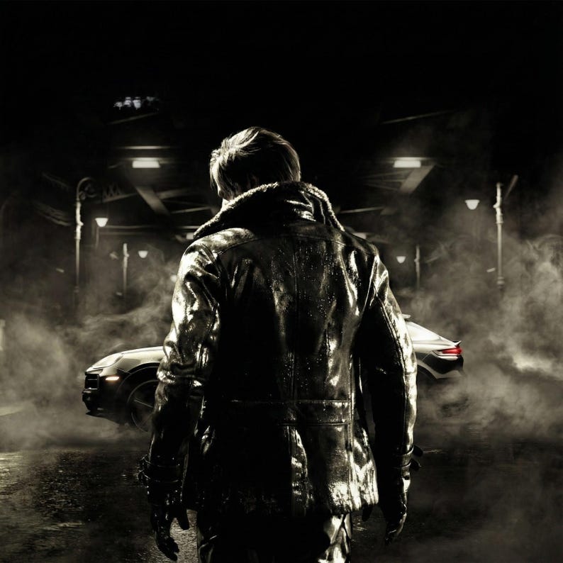 May include: A person in a black leather jacket stands in a dimly lit, foggy street, facing away from the camera. A sleek black car is parked nearby. The scene is captured in black and white, creating a dramatic, noir atmosphere.