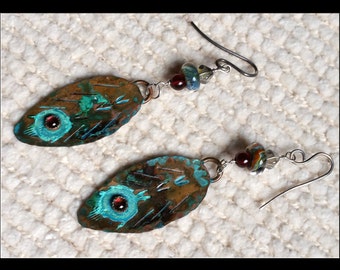 Feather and garnet earrings