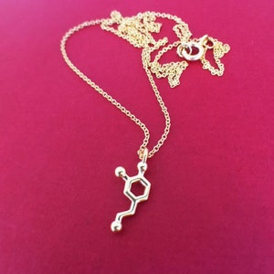 tiny dopamine necklace in 14K yellow gold plate