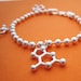 see more listings in the molecule bracelets section