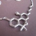 see more listings in the molecule necklaces section