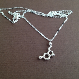 tiny serotonin necklace in solid sterling silver