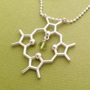 chlorophyll molecule necklace with peridot