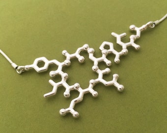 oxytocin necklace - suspended - trust, bonding, love - in solid sterling silver