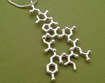 oxytocin necklace - dangling - trust, bonding, love - in solid sterling silver