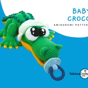 DeliciousCrochet Baby Croco. This is a crochet pattern, not the finished toy. Using DK or Sports acrylic yarn with a 2.5 mm hook, the croco is 16 inches long. Baby cap and pacifier are removable. Instructions available in English (US) or Spanish.