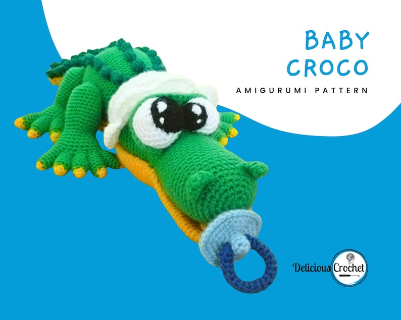 DeliciousCrochet Baby Croco. This is a crochet pattern, not the finished toy. Using DK or Sports acrylic yarn with a 2.5 mm hook, the croco is 16 inches long. Baby cap and pacifier are removable. Instructions available in English (US) or Spanish.