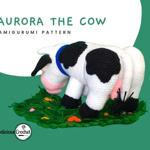 DeliciousCrochet Aurora the Cow. This is a crochet pattern, not the finished toy. Using DK or Sports acrylic yarn with a 2.5 mm hook, the cow is 6.5 inches tall & 10 inches long; lawn 12 inches wide. Instructions available in English (US) or Spanish.