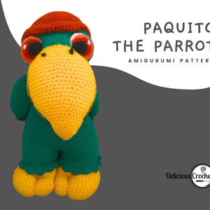 May include: A green and yellow crocheted parrot wearing a red hat. The parrot is holding its head up and looking straight ahead. The text "PAQUITO THE PARROT AMIGURUMI PATTERN" is above the parrot. The text "Delicious Crochet" is below the parrot.