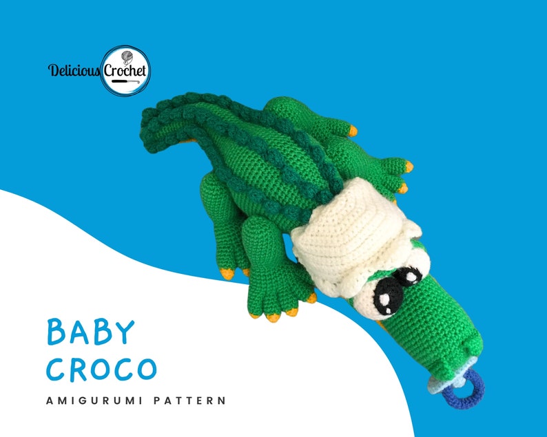 DeliciousCrochet Baby Croco. This is a crochet pattern, not the finished toy. Using DK or Sports acrylic yarn with a 2.5 mm hook, the croco is 16 inches long. Baby cap and pacifier are removable. Instructions available in English (US) or Spanish.