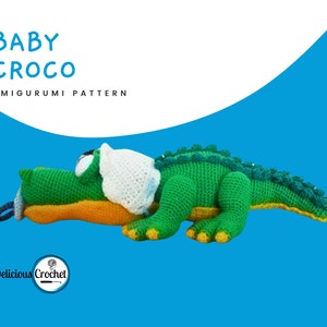 DeliciousCrochet Baby Croco. This is a crochet pattern, not the finished toy. Using DK or Sports acrylic yarn with a 2.5 mm hook, the croco is 16 inches long. Baby cap and pacifier are removable. Instructions available in English (US) or Spanish.