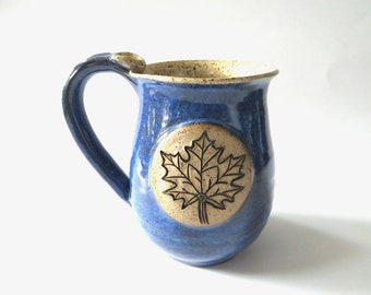 In Stock, Ready to Ship, Mug with Leaf Imprint, Speckled blue with green leaf, Holds 15 oz