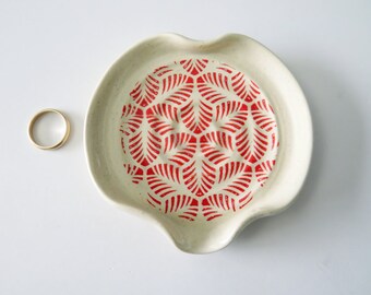 Heart shaped dish, red and white, spoon rest