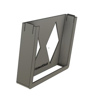 May include: A gray, 3D-printed device with a diamond-shaped cutout and the text "NetworkBuck." The device has a rectangular shape with angled sides and slots at the top. It appears to be a holder or bracket for electronic equipment.